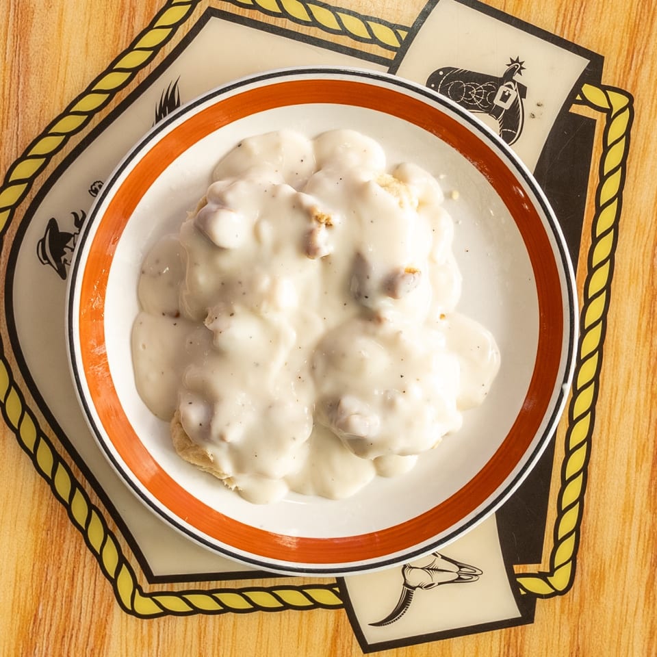 Biscuits smothered in creamy gravy.